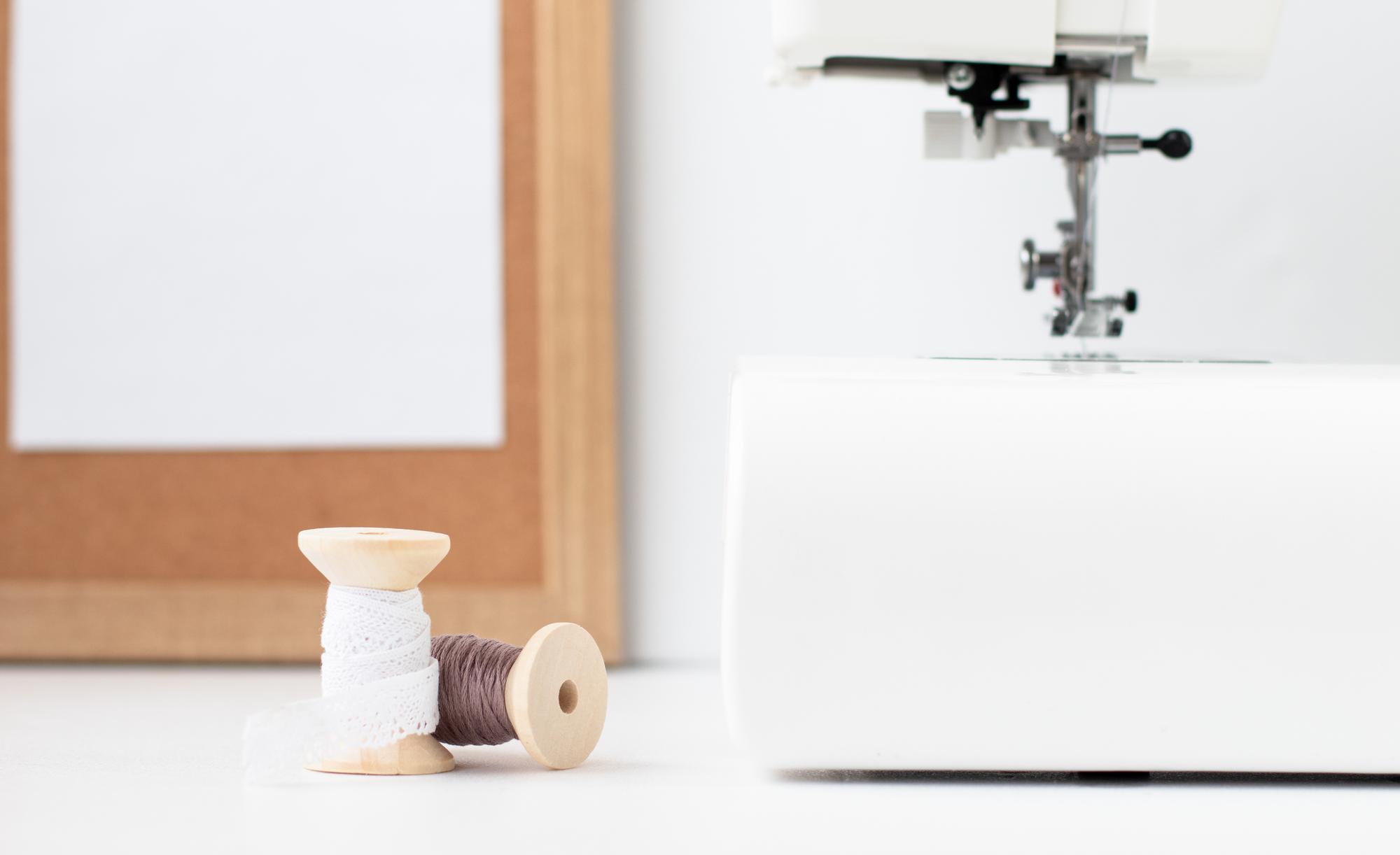 Interior of embroidery atelier with workbench and natural light