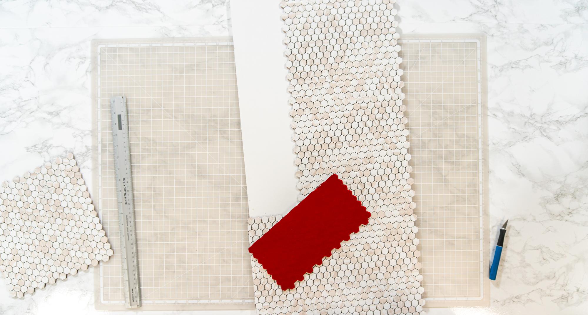 Designer sampling table with swatches and embroidered motifs